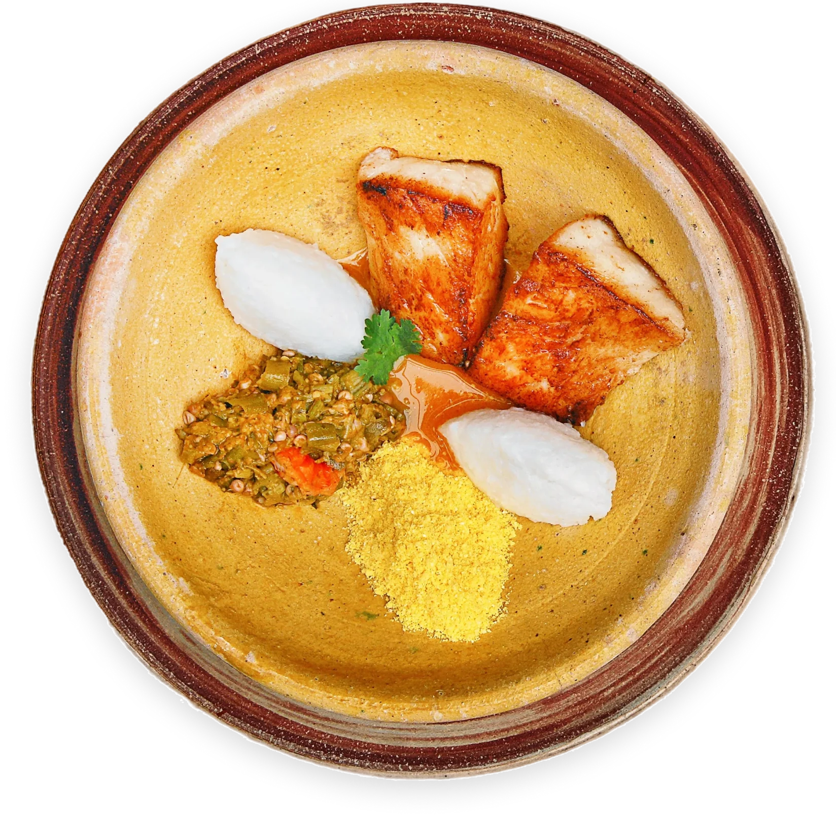 A curry served with rice and garnishes in a bowl