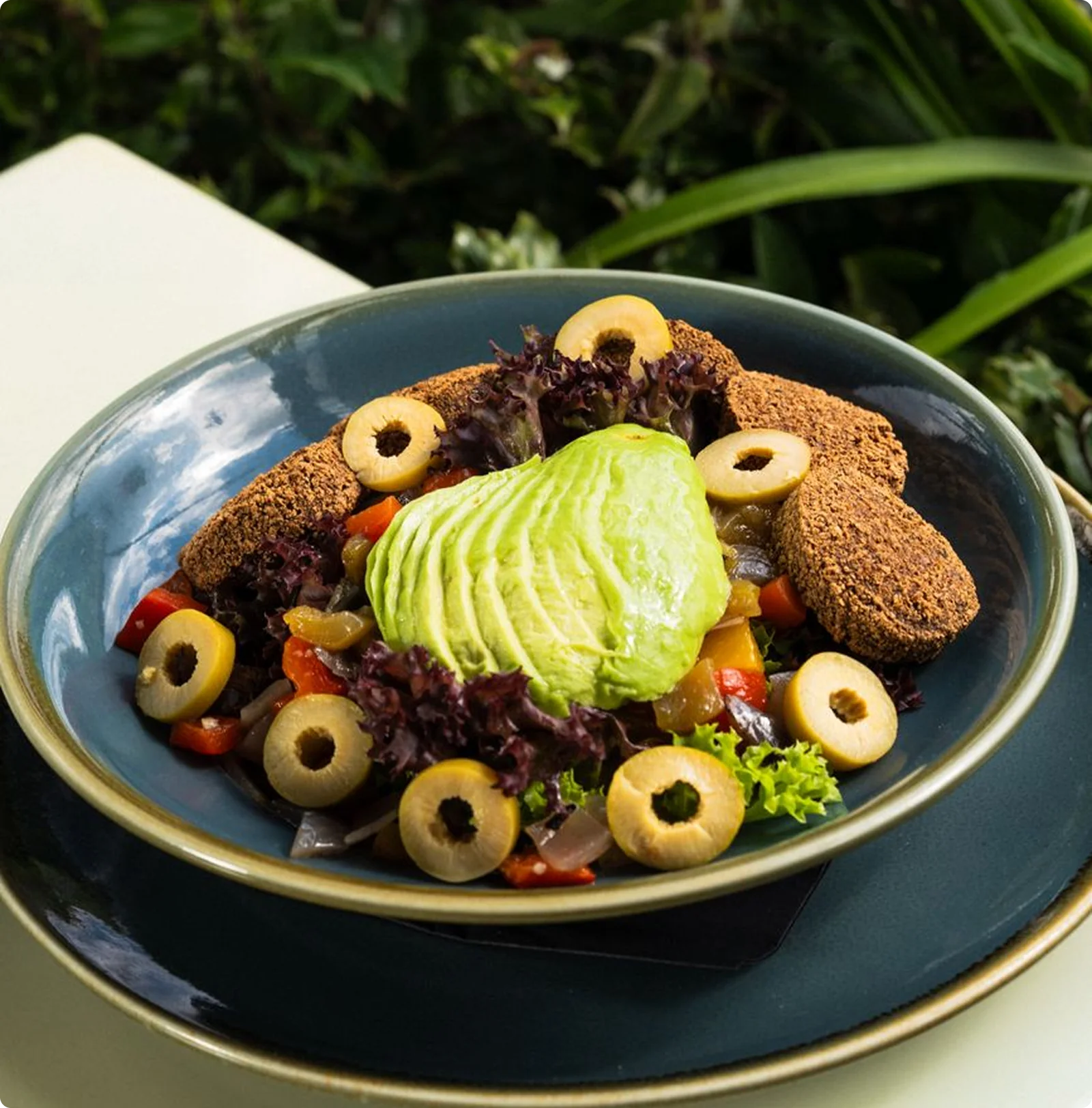 Salad bowl with avocado and olives